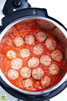 meatballs and tomato sauce in the slow cooker for making italian meatball soup