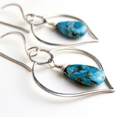 "Offered are my very elegant sterling silver and turquoise earrings! The turquoise is a very high grade Mojave turquoise that have \"been pressure stabilized, a bronze substance added to create the veining and color added to create the beautiful different colour hues.\" It's stunning! I coupled them with Balinese made sterling silver lotus leaf shaped components for a truly elegant and original pair of earrings! I have enough stones for ONLY THREE (3) PAIRS! These are so versatile - great for wo Turquoise Sterling Silver Pierced Earrings, Turquoise Earrings In Sterling Silver, Turquoise Sterling Silver Earrings For Pierced Ears, Turquoise Sterling Silver Earrings With Ear Wire, Turquoise Sterling Silver Pierced Jewelry, Pierced Turquoise Sterling Silver Jewelry, Turquoise Jewelry Earrings, Stainless Steel Bangles, Lotus Leaf