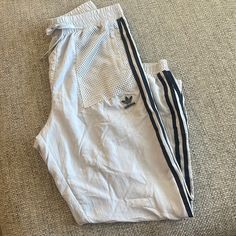 These Track Pants And Absolutely Beautiful! The Mesh Lining Is Very Soft And Cool, Perfect For Running! I’m Open To Offers :) Casual Adidas Parachute Pants With Pockets, Adidas Bottoms For Summer Loungewear, Adidas Loungewear Bottoms For Summer, Adidas Summer Loungewear Bottoms, Adidas Sporty Summer Pants, Adidas Sweatpants With Pockets For Spring, Adidas Spring Sweatpants With Pockets, Adidas Long Pants For Loungewear, Adidas Summer Bottoms With Pockets