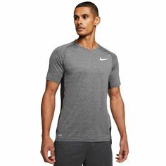 Brand new with tags! Men's Nike Victory Slim Fit Shirt The Nike Top has mesh panels in high-heat areas for cooling comfort when you're going all out. The slim-fitting design can be worn on its own or as a lightweight, sweat-wicking layer.   Dri-FIT technology wicks sweat to help you stay dry and comfortable. Mesh panels in high-heat areas on the sides and upper back let cool air in and excess heat out. Slim fit for a tailored feel Curved hem back hem 92% recycled polyester/8% spandex Machine was Nike Top, Training Shirt, Training Shirts, Training Tops, Slim Fit Shirt, Active Wear Tops, Nike Tops, Men's Nike, Men Short Sleeve