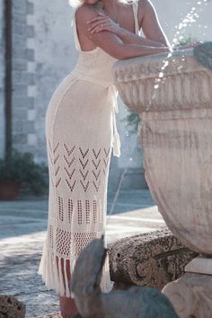 Details- intricate crochet design- open back detail with button fastening- adjustable tie waist finished with tassels- feature knot detailing on fringed hem- maxi length- soft luxe yarnSize Chart US UK/AU EU S 2-4 6-8 34-36 M 4-6 10-12 36-38 L 6-8 12-14 38-40 XL 8-10 16-18 40-42 Spring Crochet Dress With Tassels, Elegant Tassel Maxi Dress For Vacation, Elegant Fringe Maxi Dress For The Beach, Elegant Tasseled Maxi Dress For Vacation, Fitted Crochet Dress With Fringe For Spring, Intricate Crochet, Boho Style Outfits, Mini Robes, Yarn Sizes