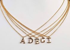 Gold Plated Tiny Pave Initial Letter Necklace, Personalized Pendant, Dainty, Bridesmaid, Wedding Minimalist Bridal Party Gift, Upper Case This beautiful minimalist necklace features a gold plated initial, encrusted with CZ crystals. Dangling from a delicate cable link chain, it's just the piece to bring an extra-special touch to your favorite outfits. It makes a heartfelt gift for your bff, your bridesmaids, or any special person in your life. Details: Materials: gold plated brass and Cubic Zirc Elegant Gold Initial Necklace With Custom Name, Elegant Initial Necklace With Round Pendant, Elegant Name Necklace For Bridesmaid Gift, Elegant Name Necklace For Bridesmaids, Elegant Custom Name Pendant Charm Necklaces, Elegant Custom Name Pendant Charm Necklace, Elegant Initial Necklace With Delicate Chain As Personalized Gift, Rose Gold Adjustable Chain Name Necklace For Wedding, Elegant Silver Adjustable Initial Necklace