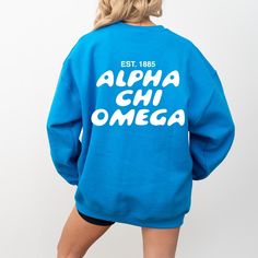 Soft, cute, and trendy, this Alpha Chi Omega Bubble Text sorority crewneck will quickly become your go-to cozy sweatshirt! Use the drop down to specify preference between pink, sapphire blue, charcoal, royal blue, carolina blue, or cardinal red. LISTING IS FOR ALPHA CHI OMEGA. Please be sure you are ordering for your correct Sorority. We only print on high quality, soft, & heavyweight materials, sustainably made and printed in the US. ♥ SIZING ♥ Unisex Sizing- For a more feminine, fitted look we School Spirit Long Sleeve Sweatshirt With Logo, Oversized Letter Print Sweatshirt For School Spirit, Oversized Sweatshirt With Letter Print For School Spirit, Oversized Letter Print Sweatshirt For School, Trendy Game Day Crew Neck Sweatshirt, Oversized School Spirit Sweatshirt For Campus, Oversized Crew Neck School Spirit Sweatshirt, Trendy Crew Neck Sweatshirt For Game Day, Oversized Crew Neck Sweatshirt With School Spirit