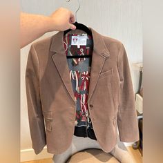 Brand New Never Worn!!!! Purchased At Gucci. Retail $2900. From The Equestrian Collection. Size : 44 Authentic Gucci Jacket In A Stunning Style. Tan Corduroy In A Cotton Blend. Suede Leather Trim At Elbow Patches. Blazer Riding Jacket Style With Single Button Front. Horn And Metal Logo Crest Buttons. Pockets At Waist. Lined In A Beautiful Silk Gucci Pattern . Made In Italy. Gucci Equestrian Collection. Perfect For Work Or Play. **Missing One Button In The Front, That’s Why The Price Is Super Low Tailored Gucci Outerwear For Spring, Chic Fitted Gucci Blazer, Gucci Classic Blazer For Spring, Classic Gucci Blazer For Spring, Luxury Gucci Blazer For Spring, Gucci Notch Lapel Blazer For Office, Gucci Tailored Blazer For Office, Gucci Fitted Blazer For Office, Gucci Chic Single-breasted Blazer