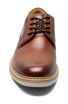 A versatile leather plain toe derby to complete all your business casual looks for time to come. Plain toe Lace-up style Leather upper/textile lining/rubber sole Imported Leather Lace-up Shoes With Textured Sole For Business Casual, Leather-lined Low-top Oxfords For Derby, Brown Oxford Shoes With Textured Sole, Oxford Moc Toe Shoes With Leather Footbed, Business Casual Oxfords With Textured Sole And Round Toe, Oxford Dress Shoes With Stitched Sole For Work, Oxford Moc Toe Dress Shoes For Business Casual, Brown Leather Oxfords With Textured Sole For Business Casual, Moc Toe Oxford Dress Shoes For Business Casual