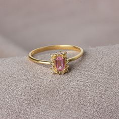 Tourmaline stone; Provides balance and harmony.It allows the person to focus on their goals.It provides sleep pattern.It strengthens and purifies the mind.It provides peace with oneself and purifies your inner world from evil. Our rectangular pink tourmaline stone ring surrounded by real diamonds will add elegance to your hands. It is a ring that you can use both on special occasions and in daily life. It is a beautiful and stylish product that you can gift to yourself and your loved ones. The c Rectangular Tourmaline Gemstone Ring, Elegant Rectangular Tourmaline Ring, Pink And Gold Ring, Rectangle Stone Ring, Pink Tourmaline Engagement Ring, Ring For Girlfriend, October Gifts, Pink Christmas Gifts, Pink Tourmaline Ring