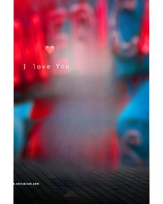 a blurry photo with the words i love you in red, white and blue