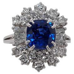 Magnificent 18kt White Gold Intense Blue Sapphire Ring , Baguette & Brilliant cut Diamonds Sapphire: 2.35 Ct Intense Blue No Heat Diamonds: 18 brilliant cut diamonds, 6 baguette cut diamonds Material: 18kt White gold Ring size: 52 EU / 6 US (Can be adjusted for Free ) Total weight: 7.1 gram / 0.250 oz / 4.6 dwt Luxury Dazzling Sapphire Diamond Ring, Luxury Dazzling Platinum Sapphire Ring, Luxury Sapphire Ring With Baguette Diamonds, Blue Diamond Ring With Baguette Diamonds, Blue Baguette Cut Diamond Ring With Baguette Diamonds, Blue Baguette Diamond Ring, Blue Diamond Cluster Ring For Formal Occasions, Blue Platinum Rings With Baguette Diamonds, Formal Blue Diamond Cluster Ring