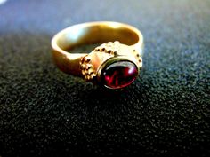 Beautiful Women's Vintage Statement Ring. it is made competely out of 14k Gold (aka Gold 585 each piece is stamped), with a stunning Garnet stone in its center... Byzantine Ring, Medieval Ring, Gold Garnet Ring, Silver Pinky Ring, Byzantine Rings, Byzantine Jewelry, Medieval Rings, Gold Pinky Ring, Mens Gemstone Rings