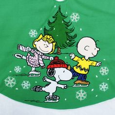 a charlie brown christmas shirt with snoop and friends on it