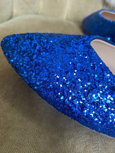 Color: Cobalt blue glitter As shown. Other Style: This is for the purchase of an pointed toe. A rounded toe can be purchased. At checkout leave a buyers note indicating the change. Shipping: Please refer to our current shipping times in the shipping section. Review prior to purchasing. If you need your item sooner then the listed time please let us know so we can confirm the availability of a rush order spot. Glitter Party Flats With Round Toe, Glitter Flats With Round Toe For Party, Glitter Round Toe Flats For Party, Blue Pointed Toe Ballet Flats, Blue Closed Toe Flats For Party, Bride Flats, Glitter Ballet Flats, Glitter Flats, Blue Glitter