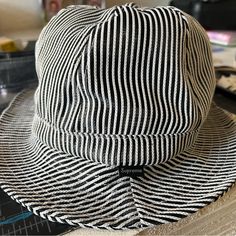 Black And White Mesh Fabric Size Small Never Worn Black Cotton Sun Hat With Curved Brim, Black Brimmed Cotton Sun Hat, Black Cotton Brimmed Sun Hat, Black Brimmed Sun Hat For Everyday, Striped Cotton Casual Hat, Striped Cotton Hat With Curved Brim, Casual Striped Brimmed Bucket Hat, Casual Striped Sun Hat With Short Brim, Casual Striped Bucket Hat With Curved Brim