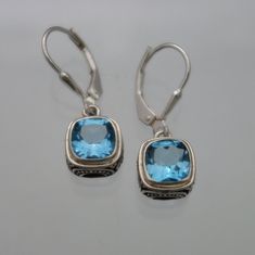 Dainty and elegant Blue Topaz Earrings. Handmade  in Bali Stone size 7mm Approx Length 1 inch approx Elegant Blue Hypoallergenic Hoop Earrings, Elegant Hypoallergenic Blue Hoop Earrings, Elegant Blue Topaz Earrings Gift, Formal Blue Topaz Drop Earrings, Blue Topaz Drop Earrings For Gift, Blue Topaz Earrings As A Gift, Blue Earrings With Ear Wire For Anniversary, Pierced Blue Topaz Dangle Jewelry, Blue Ear Wire Earrings For Anniversary