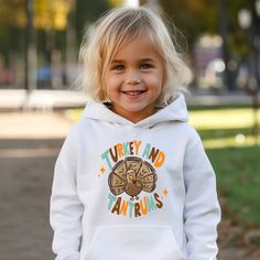 Introducing our adorable Turkey and Tantrums Toddler Hoodie, the perfect addition to your little one's wardrobe! Designed with comfort and style in mind, this long sleeve toddler hoodie is a must-have for any trendy tot. Featuring a charming turkey print on the front, this hoodie adds a touch of whimsy to your child's outfit. The vibrant colors and playful design are sure to capture attention and spark imagination. Whether it's for Thanksgiving festivities or everyday wear, this hoodie is a vers Thanksgiving Festivities, Turkey Print, Tantrums Toddler, Country Clothing, Toddler Hoodie, Christian Apparel, Country Outfits, Christian Clothing, Playful Design