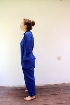 "Vintage blue chore coveralls from Israeli flight school printed in Hebrew on the back and front...\" Amal Ramat David Building the future\" with an F16 airplane drawing on the back panel, pockets with velcro opening, zips down the front, elastic waist on the back, soft cotton. an oversize and loose fit can be worn by both men and women. aside from minor signs of wear...The back hem of the pants is worn, otherwise, good vintage condition clean ready to wear. **Model is 5'8\" and a size s/m for r Blue Relaxed Fit Utility Jumpsuit Or Romper, Blue Utility Jumpsuits And Rompers With Relaxed Fit, Blue Fitted Utility Jumpsuits And Rompers, Blue Fitted Utility Jumpsuit, Blue Utility Jumpsuit With Relaxed Fit, Blue Relaxed Fit Utility Jumpsuits And Rompers, Blue Cotton Jumpsuits With Side Pockets, Blue Utility Jumpsuits And Rompers For Work, Blue Overall Jumpsuit For Work