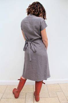 Our love of linen continues with this lovely linen wrap dress. Made in light weight Grey linen fabric, which has been prewashed giving a soft feel. With its flattering sleeves and the all essential Voy side pocket. This will quickly become one of your go-to dresses, and will find it really useful both for work and play! A capsule wardrobe must for the coming season! Length is below knee to mid-calf. Handmade in our studio to order Easy care as you can hand/machine wash. Linen used is Oeko Tex ce Linen Wrap Dress, Gray Linen, Dresses Uk, Side Pocket, Mid Calf, Our Love, Capsule Wardrobe, Linen Fabric, Wrap Dress