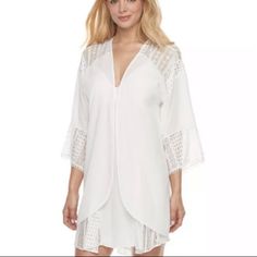 Refresh Your Lingerie Collection With This Women's Apt. 9 Kimono Wrap. Product Features Romantic Chiffon Fabric Beautiful Lace Back Yoke & Sleeves 3/4-Length Sleeves With Pom-Pom Trim Open Front Fabric & Care Polyester Machine Wash - Delicate White V-neck Cover-up For Loungewear, White V-neck Loungewear Cover-up, Summer Vacation Sleepwear With Lace Trim, Summer Lace V-neck Sleepwear, Lace V-neck Summer Sleepwear, Lace V-neck Sleepwear For Summer, White Open Front Cover-up For Daywear, Lace Sleepwear For Summer Loungewear, Bohemian V-neck Sleepwear For Spring