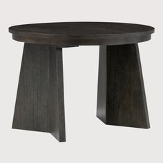 a round wooden table with two legs