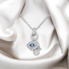 Discover protection and elegance with our 925 Sterling Silver Evil Eye and Hamsa Pendant Necklace, adorned with CZ and colored enamel. You can select size of the chain that is already included. Silver Spiritual Necklace With Cubic Zirconia, Spiritual Silver Necklace With Cubic Zirconia, Spiritual Silver Cubic Zirconia Necklace, Symbolic Sterling Silver Chain Jewelry, Elegant Sterling Silver Good Luck Charm Necklace, Fine Jewelry Sterling Silver Pendant Charm Necklace, Fine Jewelry Sterling Silver Pendant Necklace, Sterling Silver Amulet Pendant Charm Necklace, Sterling Silver Amulet Charm Necklaces With Adjustable Chain