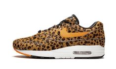 The atmos x Nike Air Max 1 “Leopard” is one of three colorways from the “Animal Pack 3. 0” collection released in 2019.  Japanese sneaker retailer atmos separated the animal prints from their famous “Animal” colorway of the Air Max 1 into three new versions of the silhouette, each featuring only one of the leopard, giraffe, and tiger prints across the entire upper.  This “Leopard” colorway is constructed in the faux fur leopard print with bright orange accents for the Swooshes, heel Nike logos, Leopard Nikes, Nike Air Max 2, Nike Air Max Ltd, Nike Air Max 98, Leopard Shoes, Womens Air Jordans, Air Jordan Sneakers, The Leopard, Nike Air Max 1