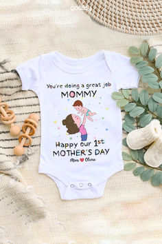 Personalized white onesie for baby's first Mother's Day, with a mother-child illustration. Features 'Great job MOMMY' and 'Happy 1st Mother's Day' with a place for baby's name, making it a special gift that celebrates a new mom's journey. You're Doing A Great Job, Custom Baby Onesies, Personalized Onesie, First Mothers Day Gifts, Custom Onesies, Best Mothers Day Gifts, Mother's Day Photos, Personalized Gifts For Mom, First Mothers Day