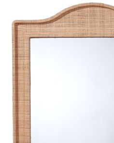 a wooden frame mirror on a white background