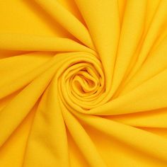 a close up shot of yellow fabric