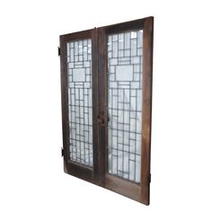 an old wooden window with glass panels on the front and back sides, isolated against a white background