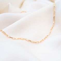 Our new Gold Box Bracelet is a classic addition to your collection. Wear one on its own for a simple look or stack with our other gold bracelets! 14k Gold Filled Available in Lengths 6.5", 7", and 7.5" 14k Gold Rectangular Paperclip Chain Bracelet, Classic Oval Link Bracelets As Gift, Elegant Chain Bracelet With Rectangular Links As Gift, Elegant Chain Bracelet With Rectangular Links For Gift, Classic Bracelet With Rectangular Links For Gifts, Classic Gold Chain Paperclip Bracelet As Gift, Classic Gold Chain Paperclip Bracelet Gift, Gold Chain Bracelet 14k Gift, Gold Chain Bracelet 14k As Gift