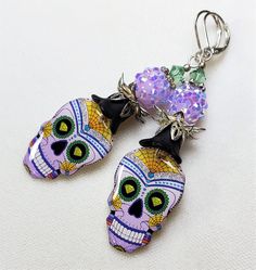 Fun and Sparkly Halloween earrings! Super lightweight. Handmade image with resin Skull charms by Canadian artist Susan. I added lavender crystal sparkle beads. These earrings are three inches long. One Of A Kind I can send it gift wrapped (free of charge), if requested and will be ready for giving Want to come see some of my other gorgeous earrings and necklaces? https://etsy.me/2Go6Uxf Sparkly Halloween, Resin Skull, Abalone Necklace, Handmade Skulls, Jewelry Resin, Artisan Earrings, Heart Dangle Earrings, Skull Jewelry, Skull Earrings