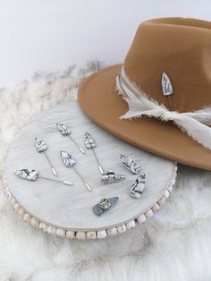 Spear Hat Pins and Spear Hat Tacks in Howlite!  Update your favorite western hat.  Pin to shirt, jacket, purse, scarf or Bandana!  Stick on your boots!  Use to keep you tie in place!  Add a little pin almost anywhere!  Pins are made from polymer clay and are super light weight! Can be stuck anywhere. The possibilities are endless!  Options: Chose Stick Pin or Tack Pin, this listing is for one pin. Tack Pins: These have butterfly closure with spring fastener so you wont loose it. Attach anywhere, Hat Pins For Cowboy Hats, Scarf Pins, Hat Jewelry, Western Hat, Purse Scarf, Scarf Pin, Hat Ideas, Western Hats, Hat Pin