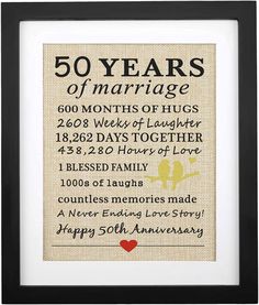 a 50th wedding anniversary gift with the words 50 years of marriage in black and white