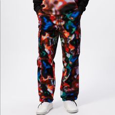 Xl - New - Zara X Rhuigi Collection Pants Made Of Technical Fabric. Adjustable Elastic Drawstring Waistband. Front Pockets And Back Flap Pockets. Back X Rhuigi Logo Print. Patch Pockets With Flaps At Legs. Adjustable Elastic Hem. X Rhuigi Special Collection. Multicolored | 1538/327 Relaxed Fit Multicolor Pants With Pockets, Multicolor Relaxed Fit Pants With Pockets, Multicolor Wide Leg Streetwear Bottoms, Multicolor Wide Leg Bottoms For Streetwear, Multicolor Pants With Pockets, Multicolor Sweatpants For Streetwear With Elastic Waistband, Multicolor Sweatpants For Streetwear, Multicolor Pants With Elastic Waistband For Streetwear, Urban Red Pants For Streetwear