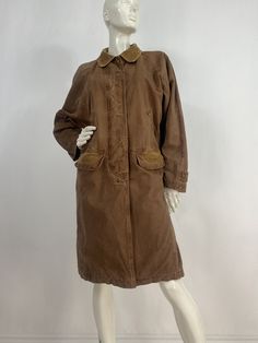 Brandon Thomas jacket, vintage Brandon Thomas coat, women's size small, would also fit medium, please verify exact measurements below  Measurements:  Shoulder 18"-19"/sleeve 22"/bust (pit-pit)24"/waist 22"/hip 22.5"/length 39.5" Mannequin measurements:  5'8", bust 34", waist 25", hip 33" Please note that vintage clothing sizes can vary greatly.  The Measurements provided  are approximate and are taken lying flat.  I suggest taking a similar garment from your wardrobe and measure it while lying f Vintage Oversized Outerwear With Pockets, Retro Oversized Brown Outerwear, Retro Brown Oversized Outerwear, Vintage Oversized Outerwear For Winter, Oversized Vintage Outerwear For Winter, Vintage Spring Outerwear With Pockets, Brown Cotton Long Coat, Vintage Oversized Single Breasted Outerwear, Vintage Oversized Single-breasted Outerwear