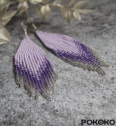 "These light purple shining beaded earrings pair amazingly with any outfit, dressy or casual. They will emphasize your individuality and compliment your personality on various occasions. Perfect for looking pulled together and on trend. They are made of high-quality Czech colored beads with sterling silver hooks and silicone plugs. Colors: light purple, silver. Length: 4.3 inches (11 cm) Width: 1.2 inches (3 cm) Materials:     Czech \"Preciosa\" beads     Durable synthetic thread     Sterling silver ear hooks     Silicone plugs If you are on the hunt for a gift that will show your significant other some love, these picks are a great solution to surprise and delight. I hope you can find everything here that you were looking for. If you have any questions related to earrings design, please f Purple Beaded Earrings, Beadwork Earrings, Purple Beaded, Earrings Diy, Luxury Earrings, Boho Style Jewelry, Bohemian Earrings, Earrings Long, Bead Jewelry