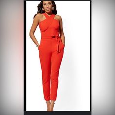 Sexy Red Jumpsuit With Crossed Front. Red Strapless Jumpsuit For Night Out In Spring, Red Strapless Jumpsuit For Spring Night Out, Red Stretch Jumpsuit For Date Night, Chic Red High Waist Jumpsuits And Rompers, High Waist Red Jumpsuits And Rompers For Night Out, Chic Red High-waisted Jumpsuits And Rompers, Trendy Red Jumpsuits And Rompers For Party, Chic Red Overall Jumpsuit, Red Trendy Jumpsuits And Rompers For Party