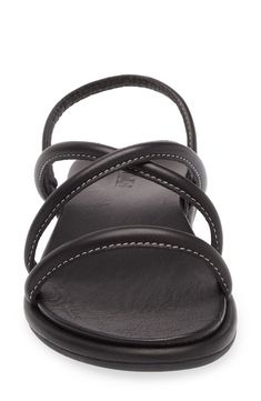 Tubular straps add modern appeal to a sleek leather sandal grounded by a cushioned footbed for lasting comfort. Cushioned footbed with arch support Leather upper/synthetic lining/rubber sole Imported Modern Slingback Sandals With Arch Support For Beach, Synthetic Sandals With Adjustable Strap For Everyday Use, Adjustable Strap Synthetic Sandals For Everyday Use, Black Slingback Sandals With Cushioned Footbed, Everyday Synthetic Sandals With Adjustable Strap, Black Slingback Sandals With Arch Support, Black Leather Slingback Sandals With Leather Footbed, Modern Black Toe Loop Sandals, Black Cushioned Sandals