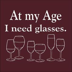 the words at my age i need glasses are written in white on a maroon background