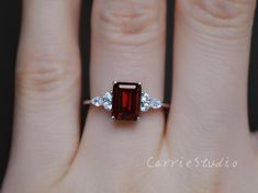 Emerald Cut Natural Garnet ring, made with 925 sterling silver, plated with white gold, beautiful promise ring, special gift for anniversary.Main Stone: Natural GarnetCut: EmeraldMeasurerment: 6*8 mm Side Stone: CZCS0328 Classic Ruby Cubic Zirconia Promise Ring, Elegant Garnet Birthstone Ring, Formal Solitaire Birthstone Ring In Sterling Silver, Garnet Emerald Cut Promise Ring, Classic Ruby Ring In Cubic Zirconia For Promise, Classic Ruby Ring With Cubic Zirconia For Promise, Elegant Garnet Solitaire Ruby Ring, Emerald Cut Garnet Promise Ring, Elegant Solitaire Garnet Ruby Ring