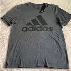 New Dark Gray Adidas T-Shirt Black Tri-blend Casual Shirt, Casual Black Tri-blend Shirt, Adidas Gray Cotton Tops, Gray Crew Neck Shirt With Logo Print, Casual Gray Sports Shirt, Gray Logo Print Casual Shirt, Gray Casual Shirt With Logo Print, Casual Gray Shirt With Logo Print, Gray Adidas