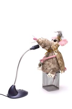 a mouse with a microphone hooked up to it's head, standing on its hind legs