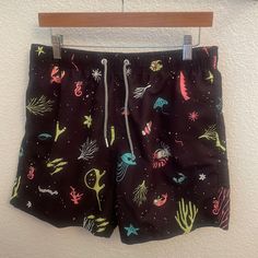 Boardies Apparel Swimming Trunks Black Background With Fun Sea Life Print In White And Muted Neon Colors Yellow, Pink And Blue Functional Drawstrings And Elastic Waist 2 Front Pockets One Back Pocket With Velcro Closure Size L Never Worn, Nwt B Casual Patterned Swimwear For Spring, Casual Multicolor Graphic Print Swimwear, Black Relaxed Fit Swimwear For Summer, Casual Patterned Swimwear For Beach Season, Casual Black Swimwear For Beach Season, Casual Black Swimwear, Black Short Swimwear For Spring, Black Graphic Print Swimwear For Beach, Black Graphic Print Swimwear For Summer