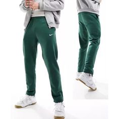 Elevate Your Activewear With These Nike Joggers, Perfect For Any Occasion From Casual To Formal. Made From 100% Cotton With A Fleece Lining, These Pants Offer Comfort And Easy Care. The Tapered Leg Style Features A Drawstring Closure And Athletic Fit, Making Them Ideal For Activities Such As Soccer, Basketball, And Cycling. Available In Green And Size Medium, These Nike Joggers Are Part Of The Nike Fleece Product Line In. Whether You're Hitting The Beach Or Hitting The Gym, These Pants Are Perfe Green Pants For Winter Streetwear, Green Winter Streetwear Pants, Nike Sweatpants For Winter Jogging, Nike Cotton Winter Joggers, Nike Winter Jogging Sweatpants, Nike Winter Sweatpants, Green Sweatpants With Elastic Waistband For Winter, Green Athleisure Pants With Ribbed Cuffs, Winter Green Sweatpants With Elastic Waistband