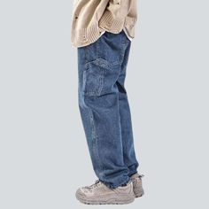 Bringing you back to the 20th-century with a bang. we present the 2023 Spring-Summer Collection's Carpenter Slouchy Men's Denim Pants! A timeless classic. each detail of this medium wash. mid-waist. baggy wonder has been designed to make you look and feel your best.Why You'll Fall In LoveThese pants are the perfect balance between modern style and retro vibes. The 90s-inspired design is complemented by a unique zipper and button closure. ensuring a perfect fit and maximum comfort. Whether you're Vintage Straight Leg Cargo Jeans For Streetwear, Vintage Relaxed Fit Jeans With Cargo Pockets, Vintage Dark Wash Jeans With Cargo Pockets, Baggy Denim Blue Jeans With Patch Pockets, Baggy Washed Blue Jeans With Patch Pockets, Baggy Denim Blue Cargo Jeans In Rigid Denim, Streetwear Medium Wash Jeans With Patch Pockets, Baggy Denim Jeans With Patch Pockets, Vintage Baggy Denim Pants