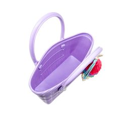 a purple plastic basket with handles and handle