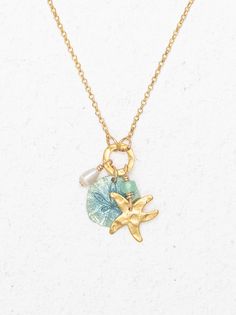 Explore the playful elegance of the Sandra Necklace, featuring charms of a pearl, starfish, and sand dollar on a slender chain. Perfect for layering or as a standalone piece. Evry Jewels, Beachy Necklace, Surf Jewelry, Hair Accessories Pins, Preppy Jewelry, Jewelry Accessories Ideas, Dope Jewelry, Jewelry Essentials, Classy Jewelry