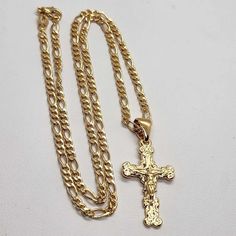 Brand New Brazilian 18k Gold Filled Cross Necklace Length Is 20" Free Jewelry Bag Included Nwt Does Not Tarnish It Can Last For Years With Proper Care Classic Gold Crucifix Necklace, Figaro Chain Cross Necklace As Gift, Gold Cross Necklace With Figaro Chain For Gift, Gold Cross Necklace With Figaro Chain As Gift, Crucifix Figaro Chain Necklace As Gift, Yellow Gold Cross Necklace With Figaro Chain, Figaro Chain Crucifix Necklace As Gift, Jewel Pendant Necklace, Triple Chain Necklace