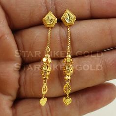 Elevate your style with these beautifully handcrafted gold earrings. Featuring a classic design and a comfortable fit, they add a refined touch to any look. Ideal for everyday wear or special occasions, they bring a subtle yet sophisticated sparkle. 18K Gold Dangle Earrings Metal is Real Gold Purity is 18kt Weight is 3.82 grams approx Max Length is 4.8 cm approx Max width is 0.8 cm approx ,  these earrings comes with normal backs, if you want real gold screw please contact. Please feel free to a Classic 22k Gold Earrings, Simple Design 14k Gold Earrings, Classic Gold Earrings With Elegant Design, 22k Gold Fine Jewelry Earrings For Formal Occasions, 22k Gold Earrings For Formal Occasions, 22k Gold Earrings For Formal Wear, Elegant Gold Earrings With Simple Design, Elegant Simple Design Gold Earrings, Gold Plated Yellow Gold Dangle Plug Earrings