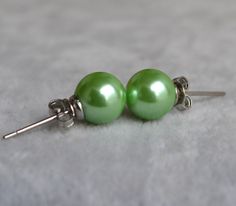 I make the earrings to use about 8mm green glass round pearls and sterling silver post .IT is good earrings for your great wedding. I can make different type earrings to your requirements,Please feel free to contact me if you have any question. Thank you so much. . matching necklace: https://www.etsy.com/listing/188435015/green-pearl-necklacesglass-pearl?ref=shop_home_active_1 Good Earrings, Green Pearl Earrings, Earrings Bridesmaid, Earrings Round, Green Pearls, Earrings Wedding, Pearl Stud Earrings, Matching Necklaces, Bridesmaid Earrings