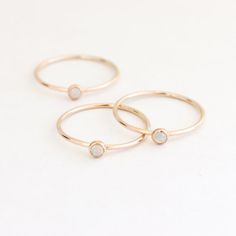 Gold opal ring. birthstone ring. mothers ring. ONE dainty - Etsy Brasil Dainty 14k Gold Filled Stackable Rings, Dainty 14k Gold-filled Stackable Promise Rings, 14k Gold Stackable Opal Promise Ring, Minimalist Opal Stackable Promise Rings, Minimalist 14k Gold Opal Promise Ring, Minimalist Opal Birthstone Promise Ring, Dainty Yellow Gold Stackable Opal Ring, Gold Opal Birthstone Ring Minimalist Style, Minimalist 14k Gold Stackable Opal Ring